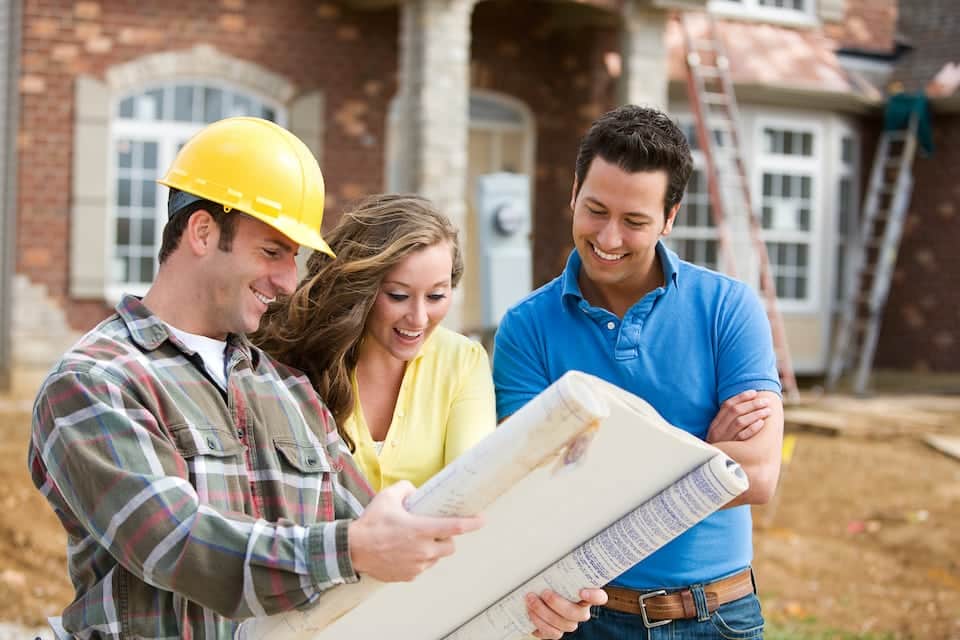 Series at a new home construction site.  Includes construction worker/builder, real estate agents, and young Caucasian couple; roofing scams