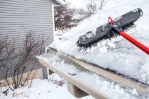 How To (Safely) Get Rid Of Ice Dams Without Damaging Your Roof