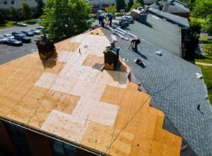 Contractors replacing entire roof
