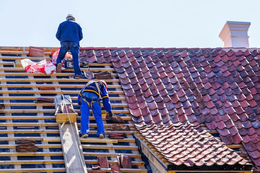 Tile roof replacement in progress