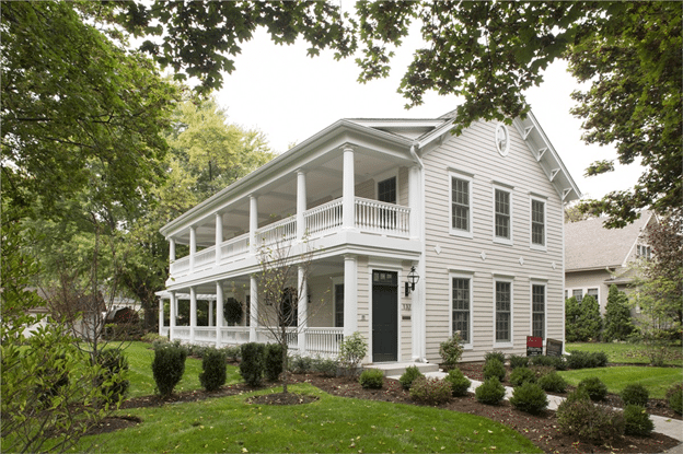 New white siding on 2-story historical home