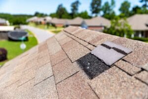 Flipped roof shingle damage